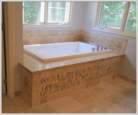 Bathtubs are as much a personal place of retreat from the world as they are the spot in our homes where we get clean. surround tub designs | Whirlpool Tub Surround Ideas in ...
