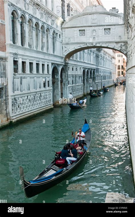 Gondola Under Bridge Sighs In Venice Hi Res Stock Photography And
