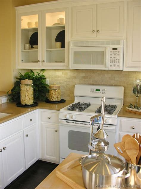Use fun medleys of vivid ceramic tile to craft bold backsplashes. Pictures of Kitchens - Traditional - White Kitchen ...