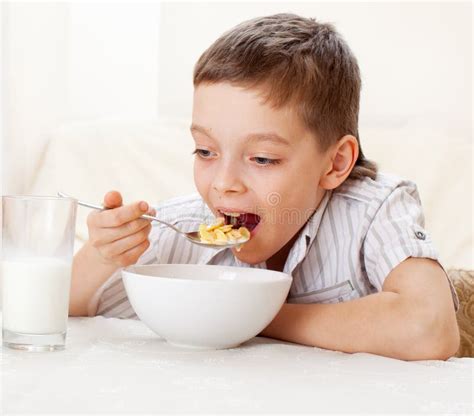 Boy Eat Breakfast At Home Stock Photo Image Of Person 65208442