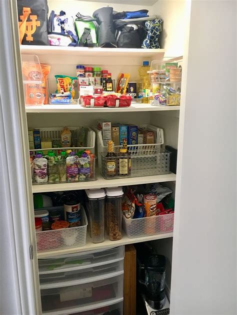 An Organized Pantry With Lots Of Food In It