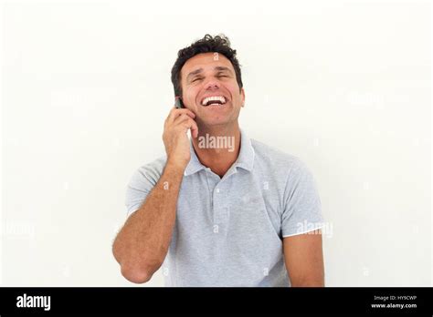 Close Up Portrait Of Handsome Older Man Laughing With Cell Phone Stock