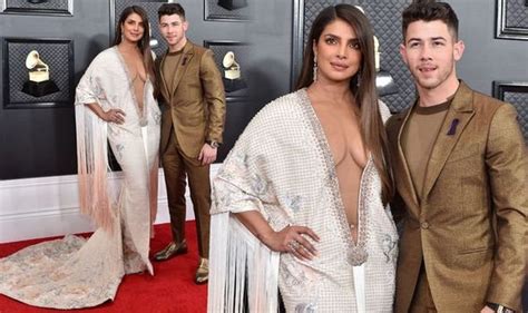 * trying to be the inspiring diva for girls who thinks th. Priyanka Chopra nearly spills out of Grammy Awards dress ...
