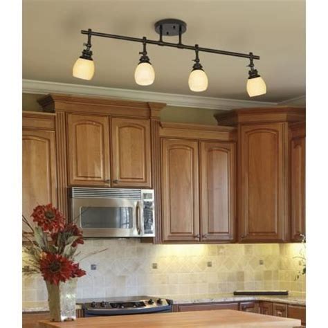 Available in a wide range of styles, ceiling lights not only provide general, ambient light but they enhance a room's overall decor. Elm Park 4-Head Bronze Track Wall or Ceiling Light Fixture ...