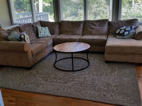 Rug placement is not an easy job while placing the rug in the living area we should place in between your couch and seating area hope, you found this article on how to place a rug under a sectional sofa helpful. Rug Placement Under Sectional Sofa - Area Rug Ideas