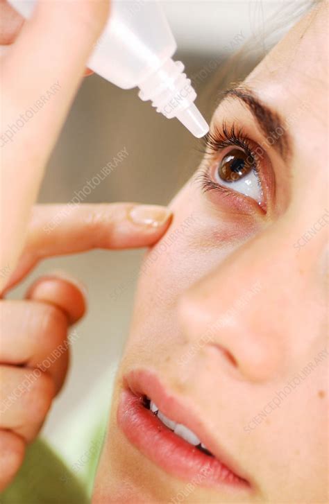 Woman Applying Eye Drops Stock Image C0309671 Science Photo Library