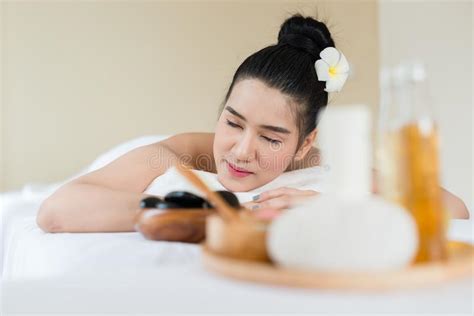 Young Beautiful Asian Woman Relaxing In The Spa Stone Massage B Stock Image Image Of
