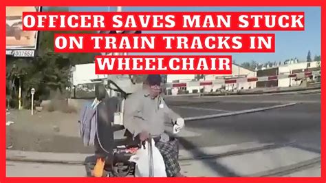 California Police Officer Saves Man Stuck On Train Tracks In Wheelchair Youtube