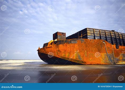 A Huge Barge Stranded At The Beach Stock Photo Image Of Blue Rusty