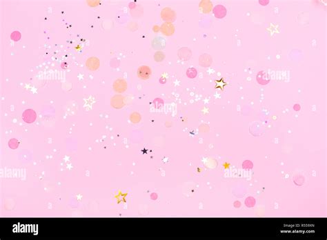 Pink Pastel Festive Background With Confetti And Sparkles Flat Lay
