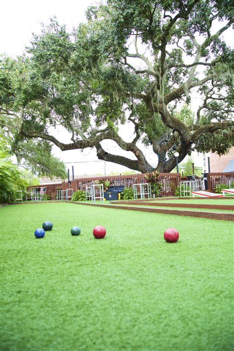 The surface of a bocce court can be covered with sand, decomposed granite, or the standard size of a bocce ball court is 90 feet by 13 feet. Beer Garden - Bocce Ball Courts | Bocce ball court, Bocce ...