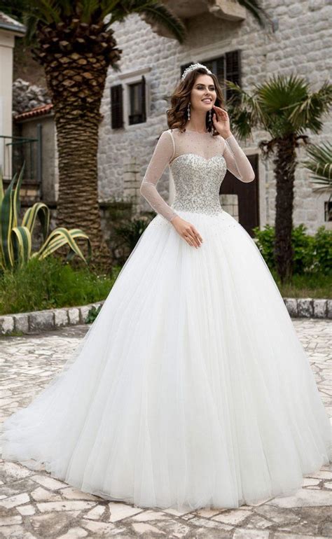 Lace wedding bridal dresses floor length long sleeve tail wedding dress 2019 from citylady. 2017 New Arrival Sheer Long Sleeve A Line Wedding Dresses ...