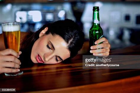 Drunk Girl At Bar Photos And Premium High Res Pictures Getty Images