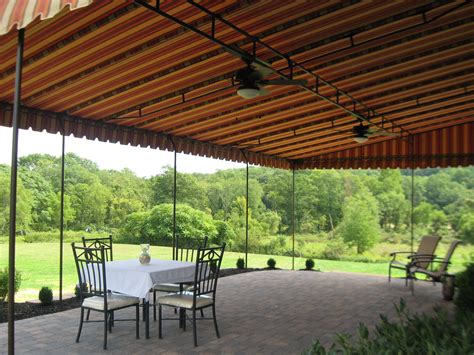 Shade sails, also known as sun shades or sun sails, don't usually require much hardware. Patio canopy featuring a bronze powder coated frame and ...