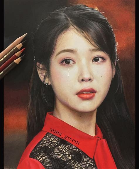 A Pencil Drawing Of A Woman With Long Black Hair And Orange Lipstick Next To Two Colored Pencils