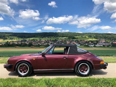 The porsche 911 (pronounced nine eleven or in german: Touring Garage AG | Porsche 911 SC Cabriolet 1983