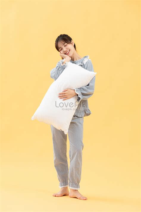 Girl In Pajamas Holding Pillow Picture And Hd Photos Free Download On