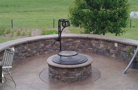 This Ultimate Fire Pit Has Tiered Bbq Grates And A Kettle Winch Fire Pit Fire Pit Backyard