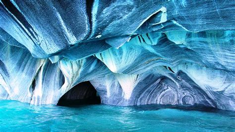 You can combine a visit to the marble caves with seeing the nearby san rafael glacier, a beautiful wall of ice hidden right in the middle of the rainforest. Amazing Places of the Earth: Marble Caves, Patagonia, Chile