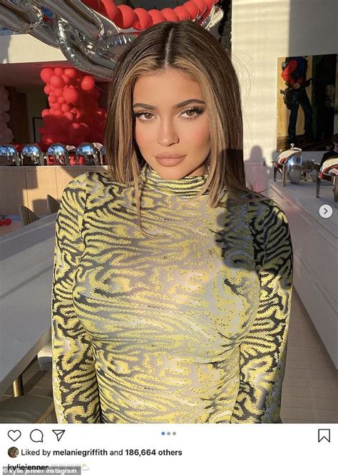 kylie jenner shows off her brunette highlights in a eye popping patterned bodysuit daily mail