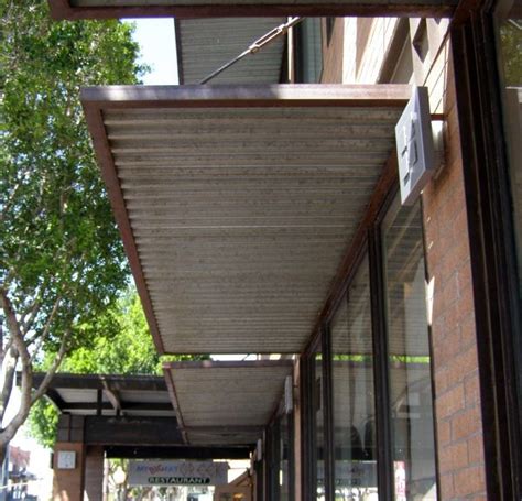 Diy awnings retractable over doors ideas, patio awnings front door, awnings for windows and for decks metal, indoor awnings window porch, fabric canvas and pvc awnings outdoor, pergola copper deck tin aluminum modern awnings backyard design vintage. Underside of Old Looking Steel Awning … | Metal awning ...