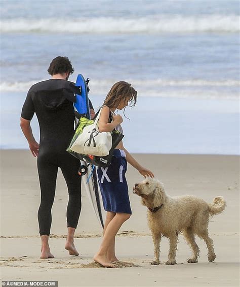 Chris And Liam Hemsworth Hit The Beach In Byron Bay With Bikini Clad Model Gabriella Brooks