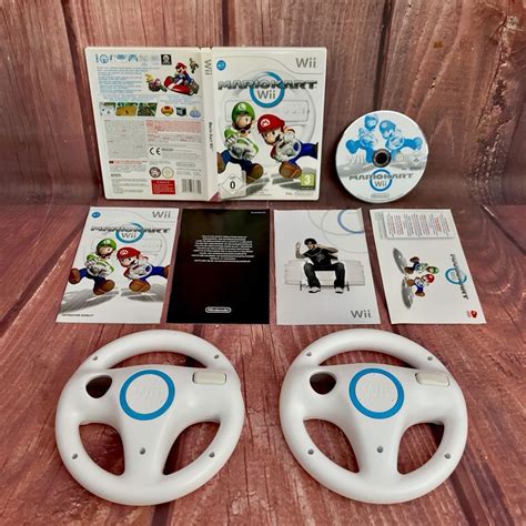 Nintendo Wii Mario Kart Cart Game And Official White Steering Wheels X2