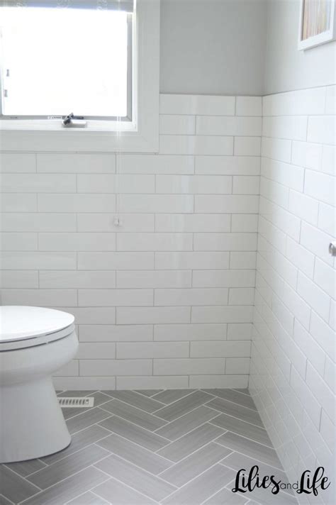 Tiles can be small or large, and the color can highlight the colors of the rest of the bathroom or contrast with them. White subway tile bathroom walls with light gray grout 27 ...