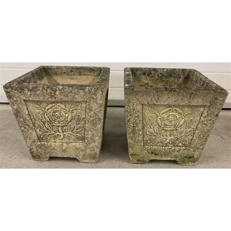 A Pair Of Cotswold Studios U29 Square Stone Planters With Carved Rose