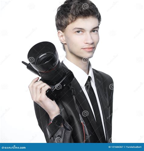 Portrait Of Young Handsome Photographer Holding The Camera Stock Image