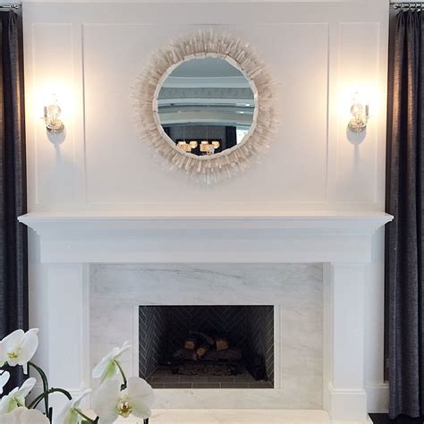 White Marble Fireplace Surround With A Gray Herringbone Firebox