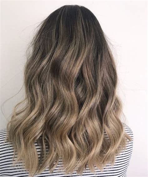 Bright blonde highlights are concentrated towards the front of her head and around the face, while the darker blonde shade takes over in the back. 20 Dirty Blonde Hair Ideas That Work on Everyone