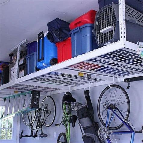 Simple overhead shop storage using ladder hooks and boards. 66. OVERHEAD GARAGE STORAGE AREA | Home Improvement Livingroom in 2019 | Overhead garage storage ...