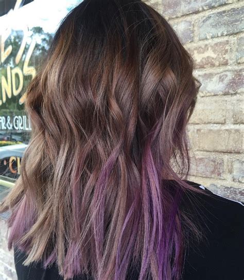 If it is also long, don`t even doubt your choice as it will look magically. Purple highlights on dark hair is the latest Instagram trend
