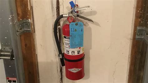 Installing A Fire Extinguisher On The Wall Youtube
