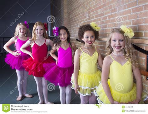 Two cute kids looking at camera. Cute Young Ballerinas At A Dance Studio Stock Photo ...