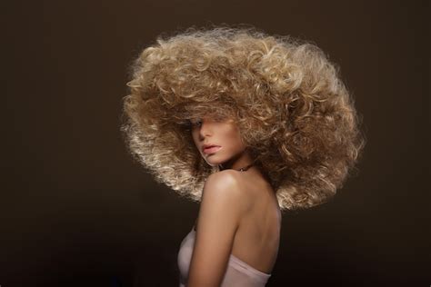 If hair has become frizzy due to humidity, you want to use an oil, serum, or cream to lock out moisture from the air, she tells bustle. Hair style essentials: Tips for curly hair & avoiding the ...