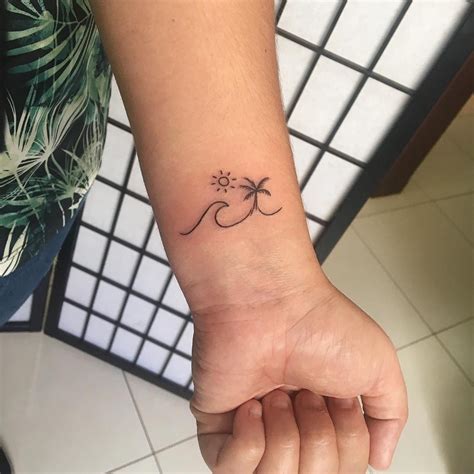 Beachy Tattoos That Will Make Your Summer Memories Last Forever Palm Tattoos Beachy