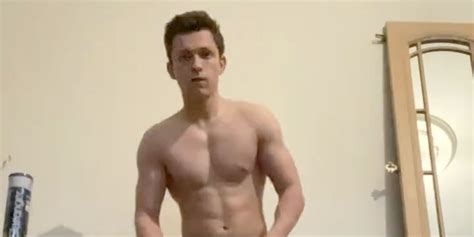 Tom Holland Attempts The Impossible Challenge Of Putting A Shirt On While Doing A Handstand