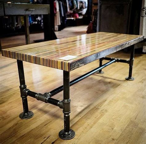 This coffee table leans into its coastal farmhouse look with natural wood finishes and a mixed material design. Butcher Block Slab Table, 2013 This coffee table contains ...