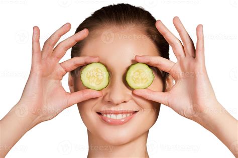 Cucumber Spa Beautiful Young Woman Holding Pieces Of Cucumber In Front Of Her Eyes And Smiling