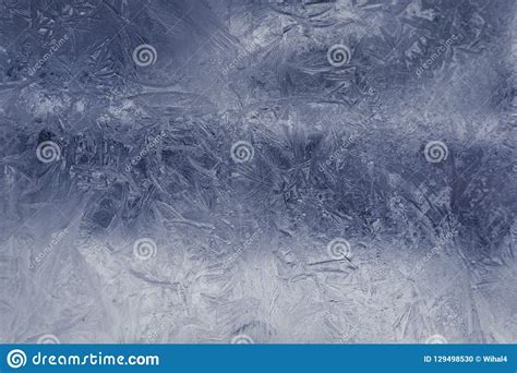 Winter Ice Pattern On The Frozen Window Texture Background For