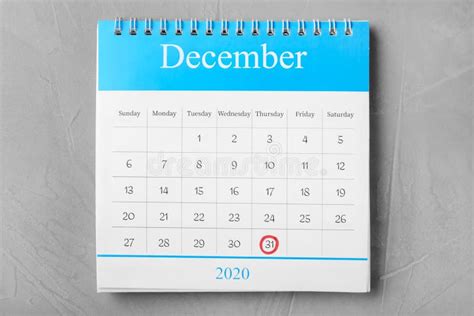 Calendar With Marked Date On Grey Stone Table Top View New Year