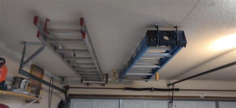 Ladder Storage On Ceiling Above Garage Door Garage Storage Diy