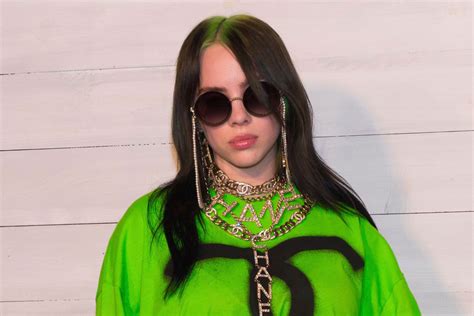In october 2020, billie eilish told us via her annual vanity fair video interview we'd never see the tattoo she got earlier that year. Singer Billie Eilish Wears Oversized Neon Look at NYC ...