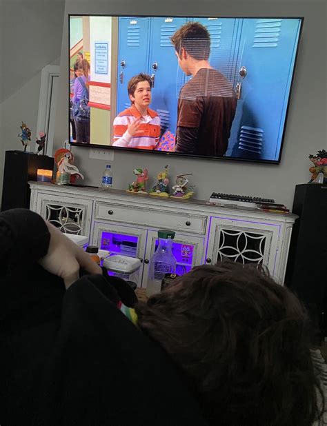 Karl Via Twitter Chris Massages His Back While He Watched Icarly