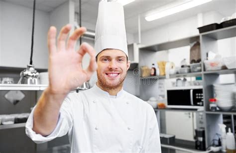 Happy Chef At Restaurant Kitchen Showing Ok Sign Stock Image Image Of