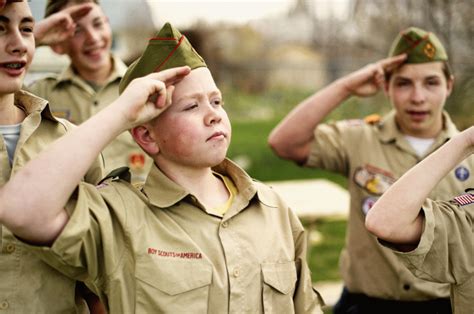 Boy Scout Saluting The Flag