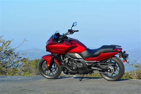 If you test rode the honda nc700x and found its 32.7 inch saddle height too tall for your frame, you'll probably find the ctx700. Honda CTX700 DCT ABS — FPS Racing Team