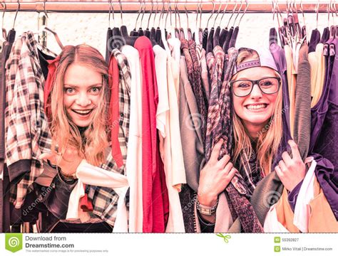 Young Hipster Women At Clothes Flea Market Best Friends